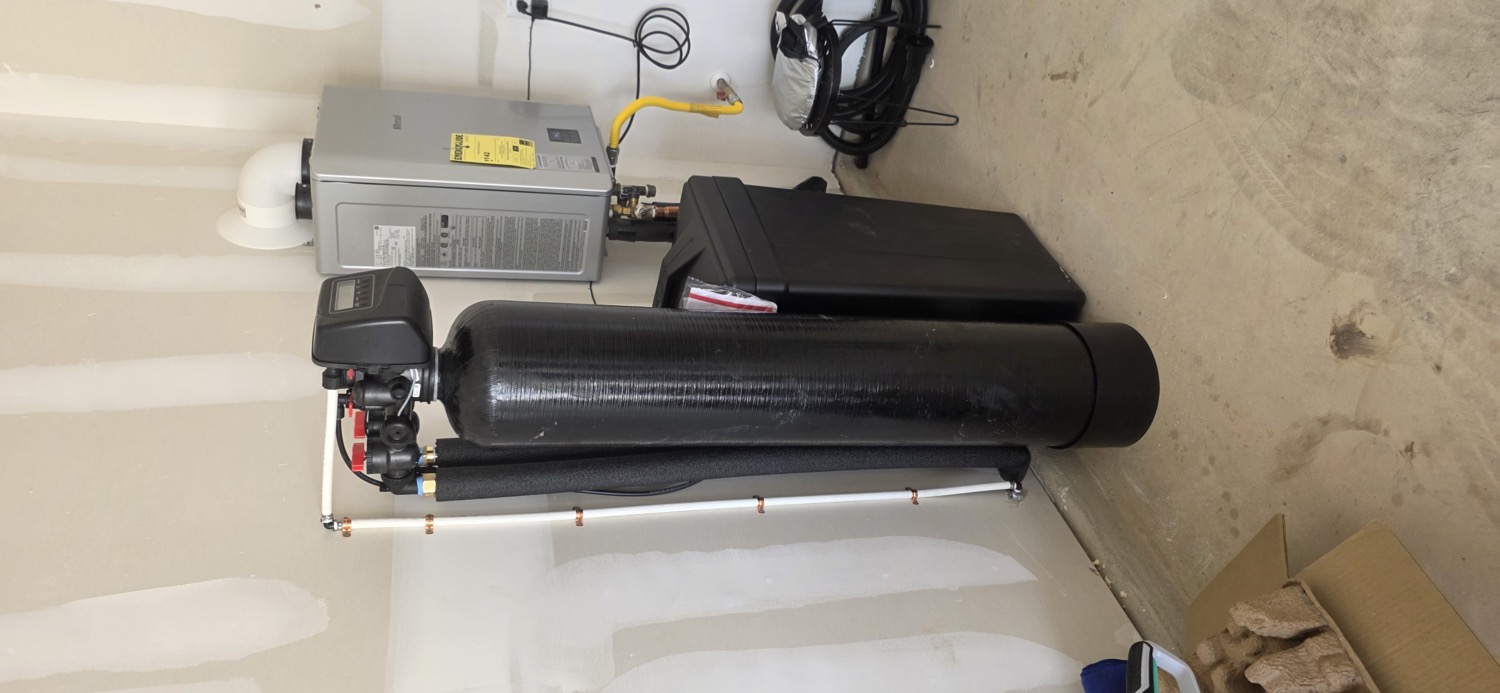 Homestead Water Co softener and filtration system, clean garage install